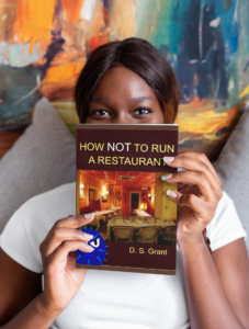 mockup-of-a-woman-holding-a-book-up-to-her-face-23693